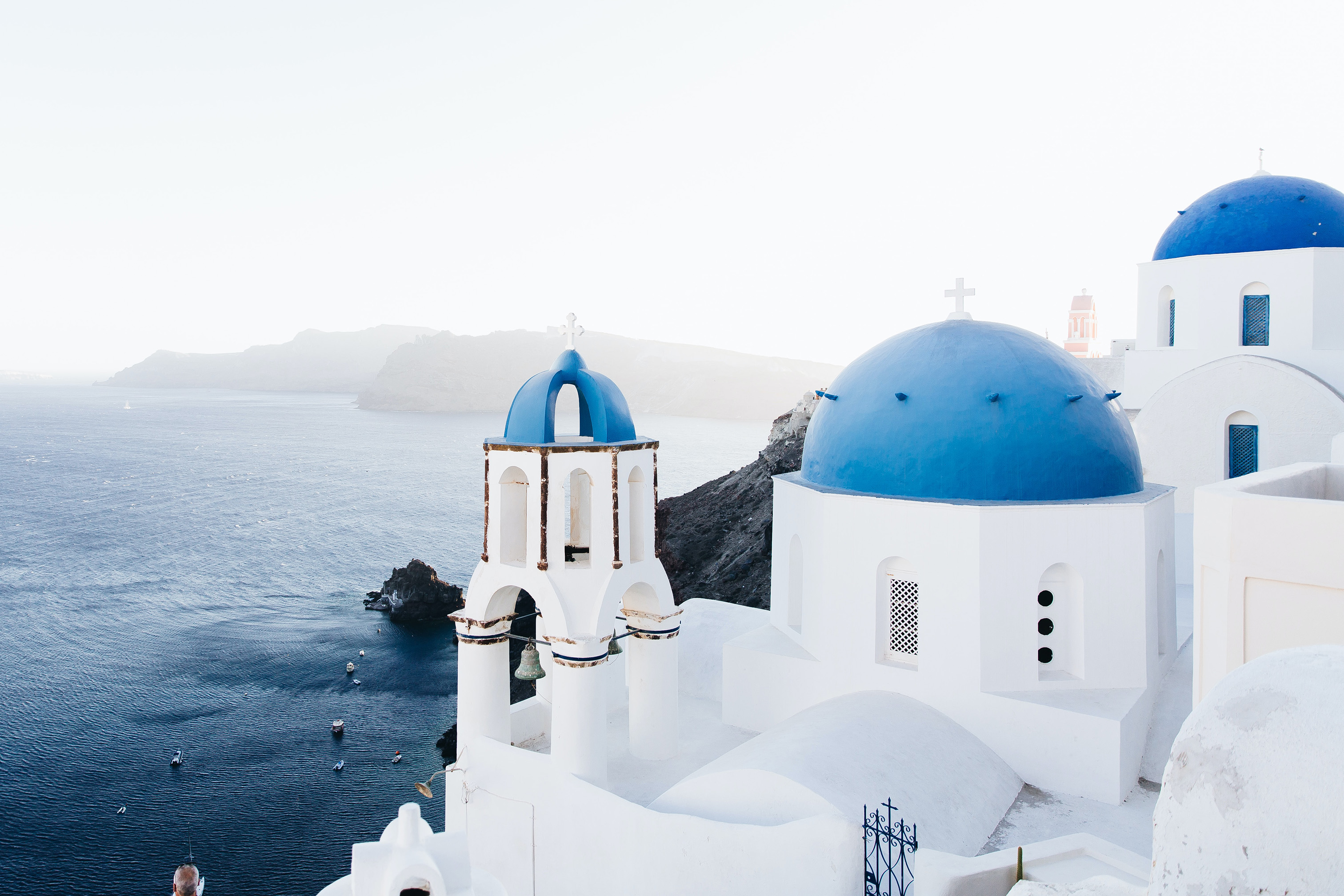 White buildings on the coastline of Santorini, Greece.