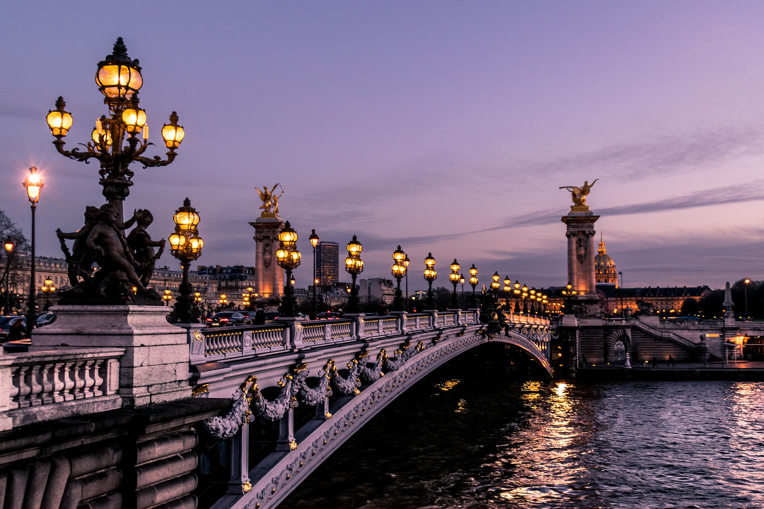 A bridge at sunset in Paris, France.